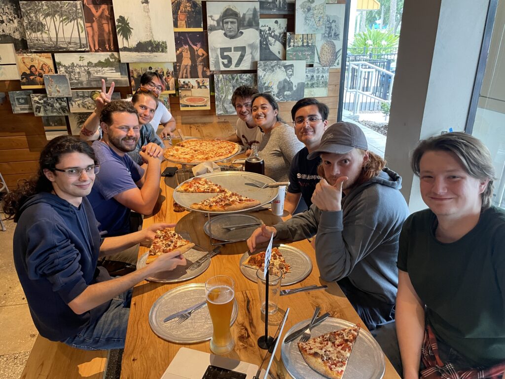 Lab group farewell pizza lunch for two departing students