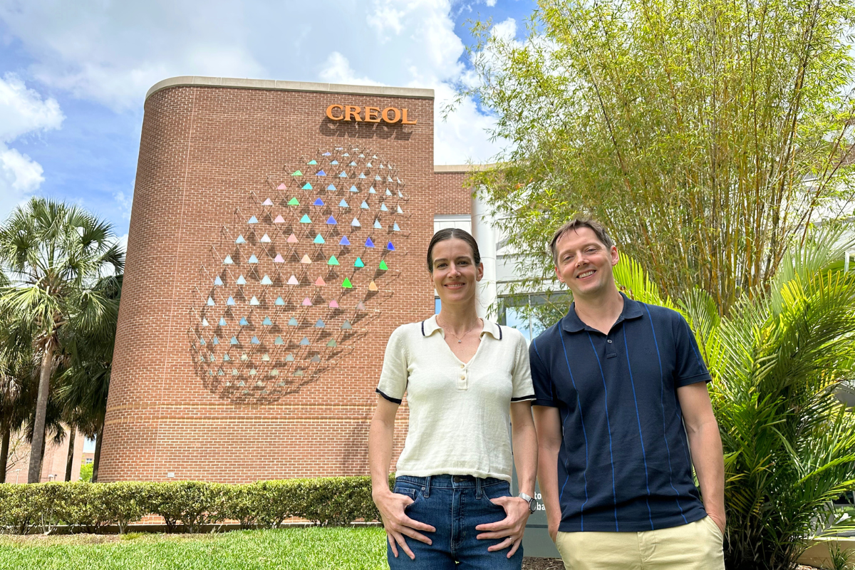 Dr. Blanco-Redondo and Dr. Hudson standing outside the CREOL building.